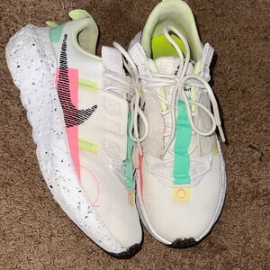 Nike Athletic Shoes in White, Pink, and Green